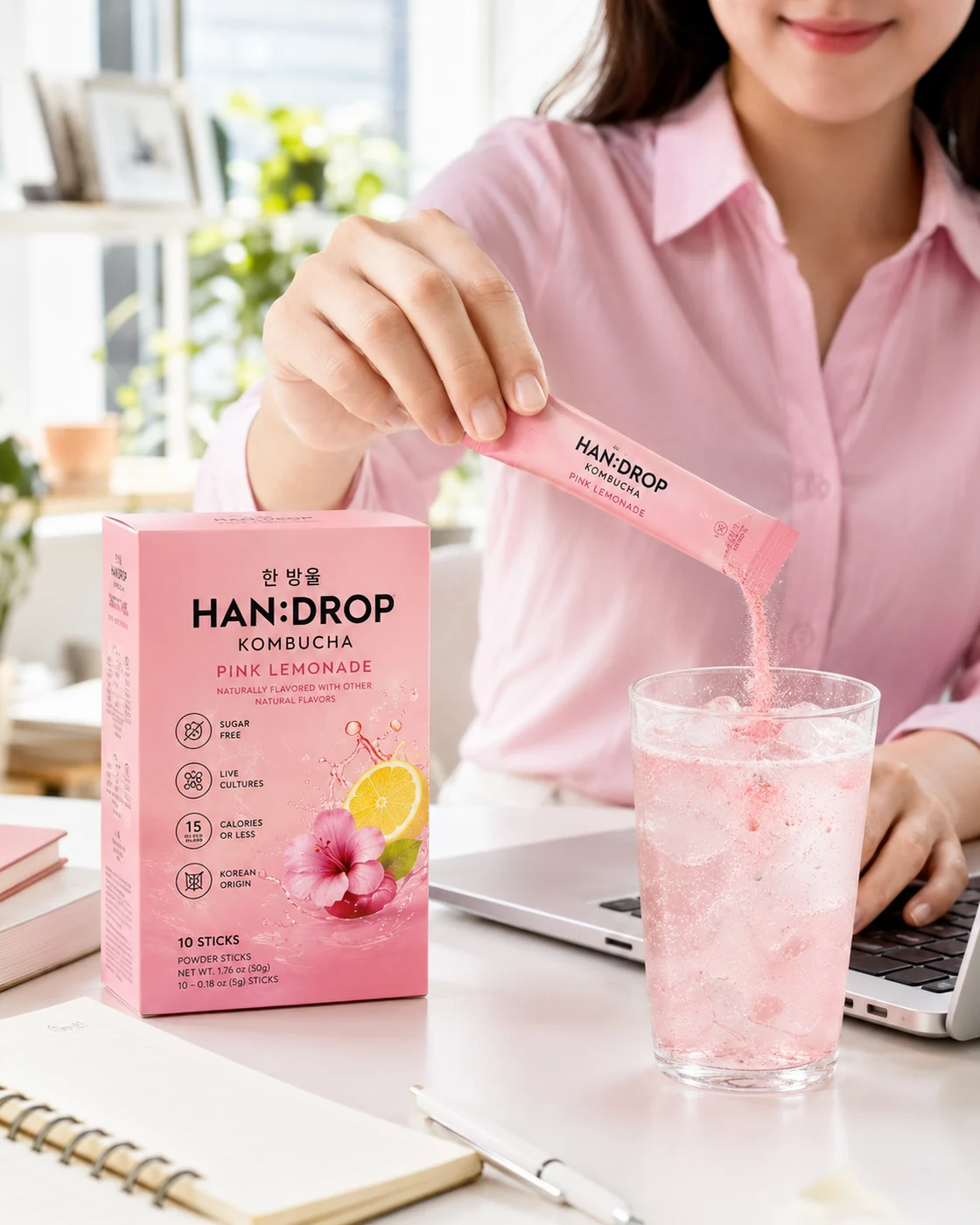 Preparing Pink Lemonade kombucha at a workspace